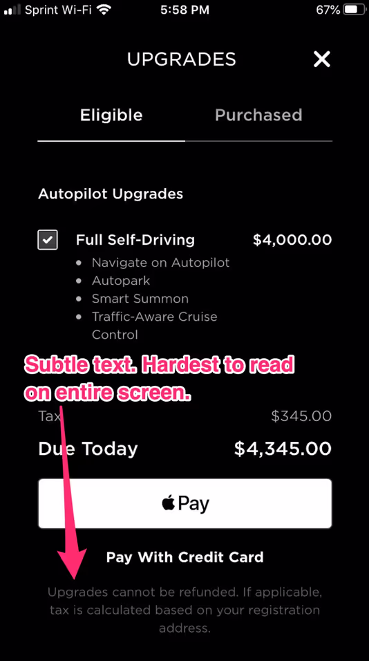 Screenshot from Tesla’s mobile app. Beneath the form asking users to purchase new upgrades is some small dark grey text informing users that ‘Upgrades cannot be refunded’. Against the black background, the text is barely visible.